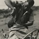 ‘Amateur barber’ among the workers on the coffee farm. Gethumbwini Estate, Thika (1945)