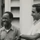 Three successful candidates in Tanganyika first general elections congratulate one another on the declaration of the poll in September of last year. They are (left to right): Mr G. T. Lewis, Mr Julius Nyerere and Mr A. H. Jamal who were elected members of the Legislative Council for the Eastern Province constituency under a tripartite voting system