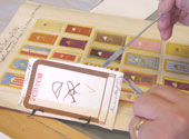 Assessing attachments to a page of racing colour designs