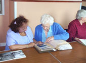 Tong Street Thursday club, Bradford, reminiscing about the 'This is Our History' community-archive project