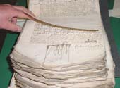 Documents at risk from handling and storage