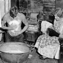 Washing at the tub in front of the fire, undated. Catalogue reference: COAL 80/2062 (7)