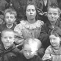Children on the steps of the Charles Thompson Poor Children's Mission, Birkenhead, 1905. Catalogue reference: COPY 1/48