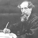 Charles Dickens at writing desk, 1910. Catalogue reference: COPY 1/541