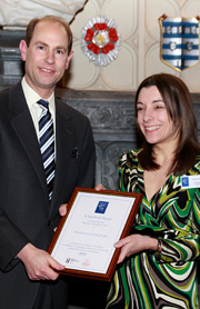 Rachel Hillman from The National Archives Education team collects the Sandford Award from Prince Edward