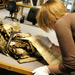 A researcher working with a delicate resource at The National Archives