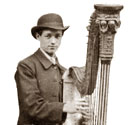 Member of a street music quartet, 1884. Cat ref: COPY 1/369 f239