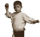 Boy playing cricket, 1901. Cat ref: COPY 1/451