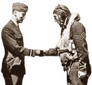 King George VI meets a pilot of Fighter Command, 1939-45. Cat ref: MFQ 1/525