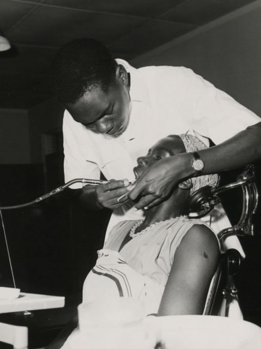 A dental assistant attends a patient at the Dental Unit, Princess Margaret Hospital, Dar es Salaam (1960) - Catalogue reference: CO 1060/164
