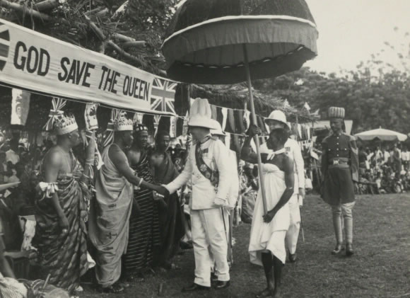 H.B shakes hands with one of the sub-chiefs during coronation time (1953) - Catalogue reference: CO 1069/99