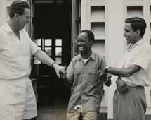Three successful candidates in Tanganyika first general elections congratulate one another on the declaration of the poll in September of last year. (Left to right): Mr G. T. Lewis, Mr Julius Nyerere and Mr A. H. Jamal were elected members of the Legislative Council for the Eastern Province constituency under a tripartite voting system - Catalogue reference: CO 1069/159