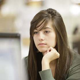 Female student in front of a computer