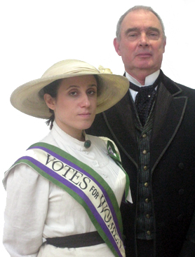 Costumed actors portraying PM Herbert Asquith and a suffragette