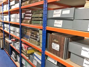 Shelving units with archive boxes on each shelf