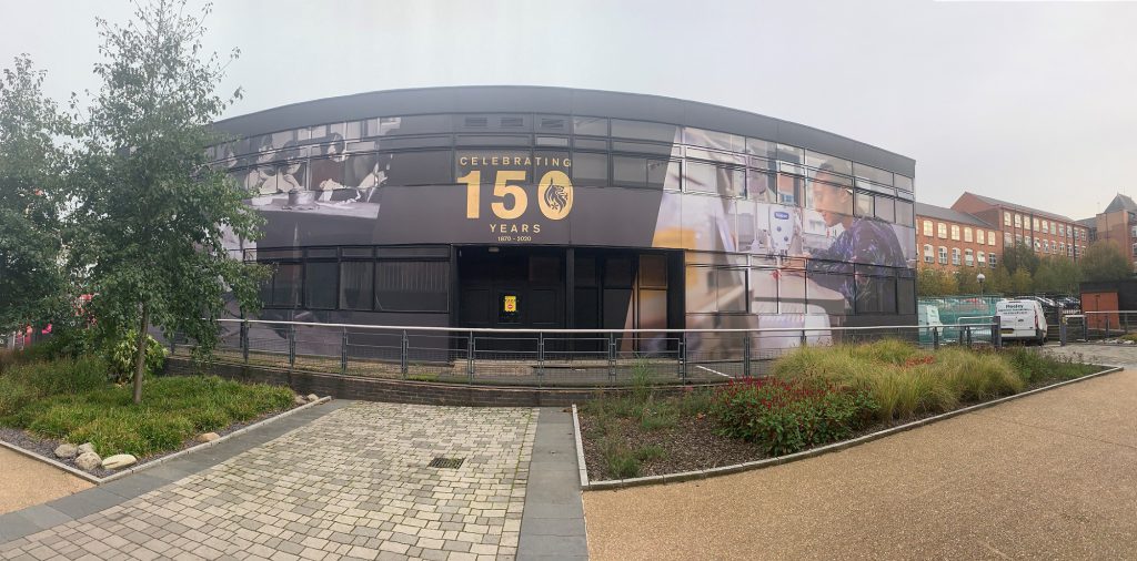 A De Montfort University building wrapped in an archive image