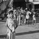 Traffic and pedestrians in Calcutta, photographed by Cecil Beaton (INF 14/432)