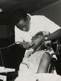 A dental assistant attends a patient at the Dental Unit, Princess Margaret Hospital, Dar es Salaam (1960) - Catalogue reference: CO 1069/164
