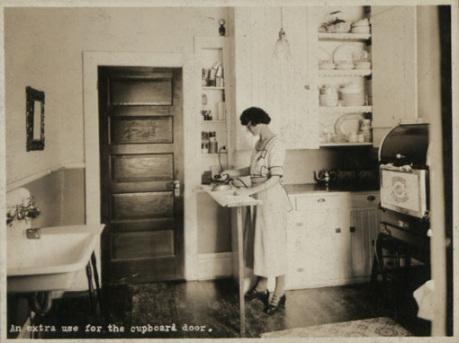 An extra use for the cupboard door: Canada, early 1920s. Catalogue reference: CO 1069/290