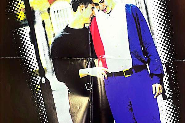 Poster of two men walking, looking affectionate and happy. With text, “Yes… to being gay...'