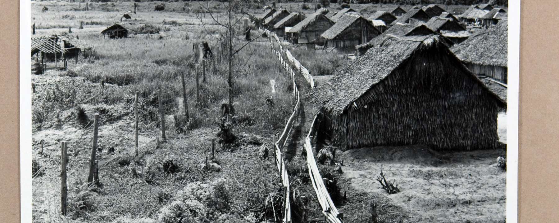 A photograph of a collection of huts and resettlement villages.