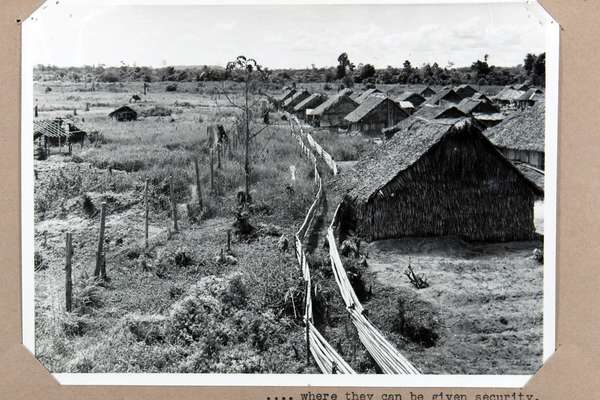 A photograph of a collection of huts and resettlement villages.