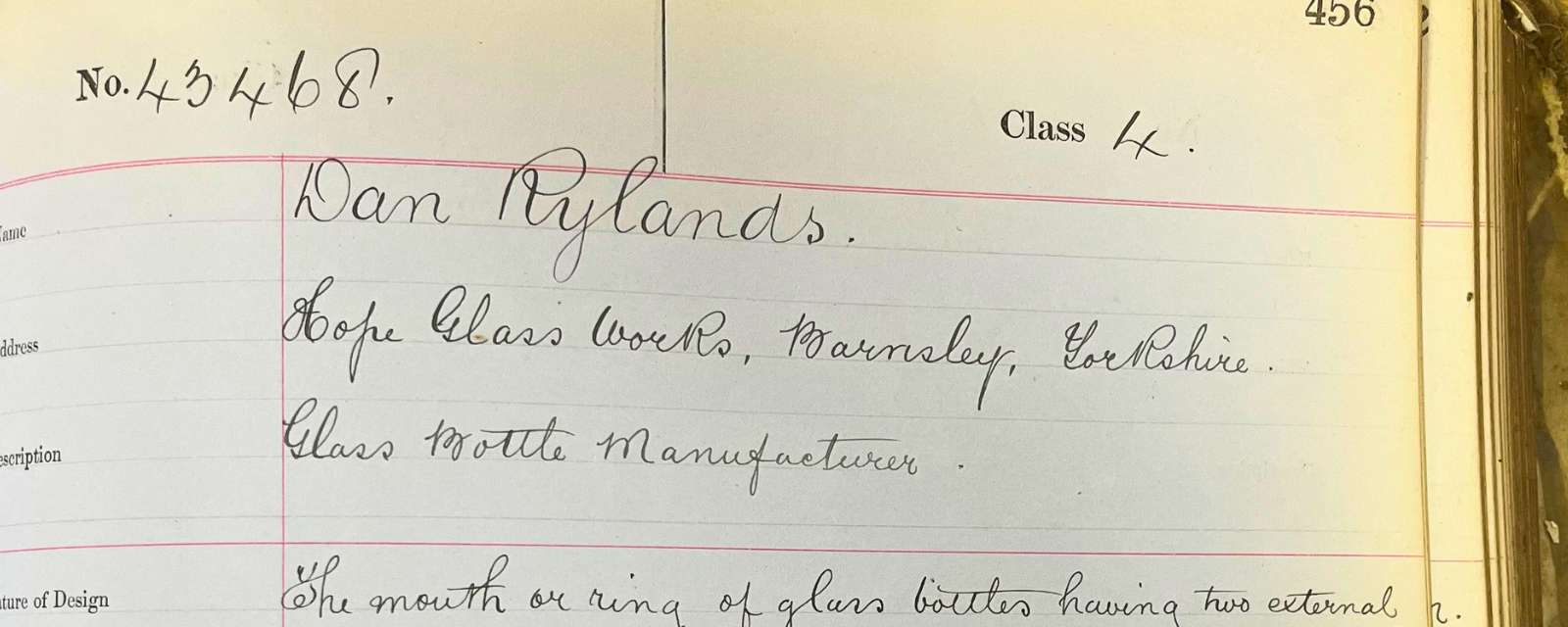 White paper in a book with black ink, handwritten text