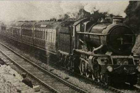 A photograph of a steam train