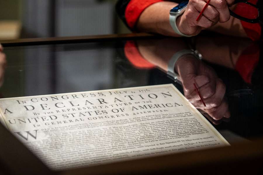 An 18th century printed document on display.