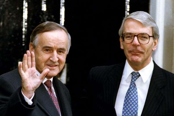Albert Reynolds and John Major. Reynolds is waving at the camera.