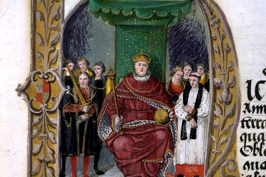 Illustration of Henry VIII sitting on a throne.