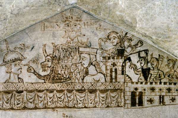 A medieval ink drawing depicts various figures, including a three headed crowned figure in the middle and a person holding scales. In the centre a devil with horns touches the noses of a man and a woman.