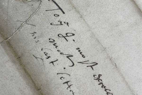 Detail of an old letter with 'His last letter' written at the bottom.