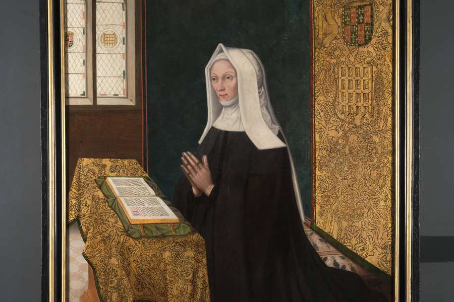 Medieval painting of woman kneeling praying