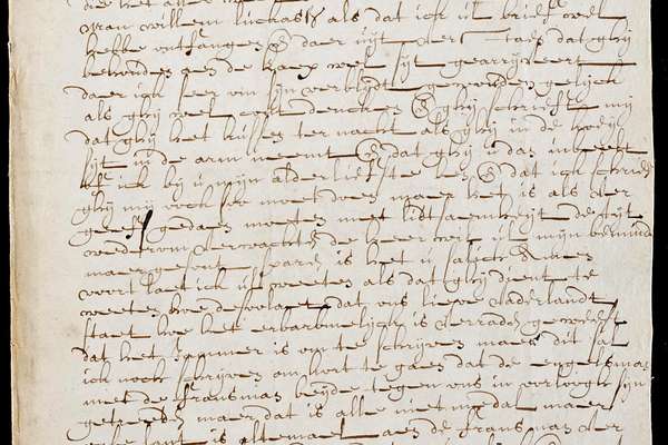 browned, handwritten letter in cursive writing