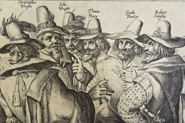 A black and white engraving of the gunpowder plotters, including Guy Fawkes.
