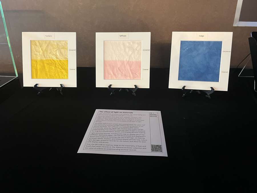 Three colour samples are on display. Each has been partially exposed to light, effecting its colouring.