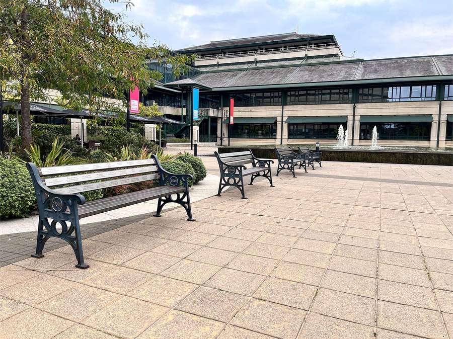 Wooden benches outside The National Archives