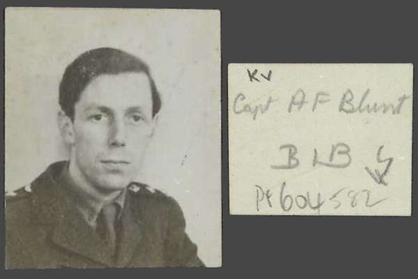 Portrait photograph of a man in military uniform with a slightly melancholy expression.