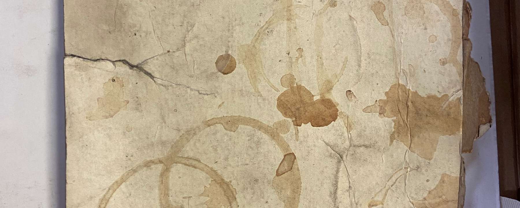 Image of cardboard with stains on it from The National Archives' collection.