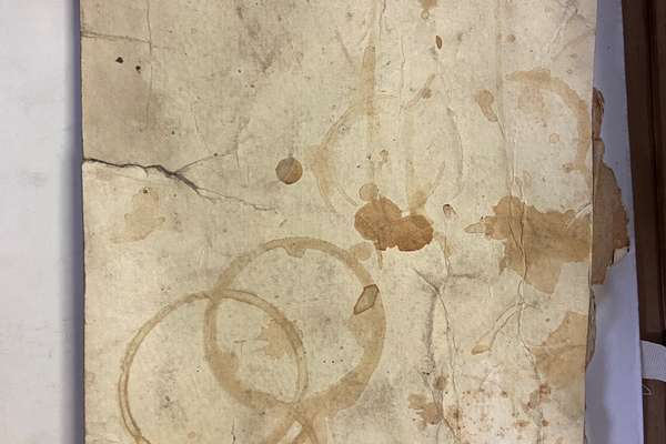Image of cardboard with stains on it from The National Archives' collection.