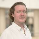 Portrait photo of Dr Euan Roger.