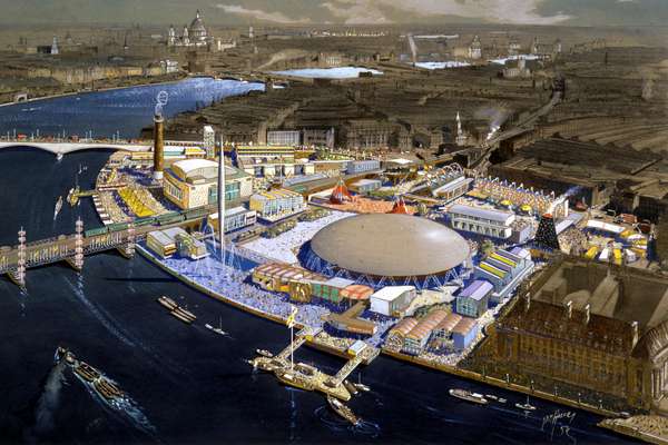 Aerial view of the Thames with a bustling, colourful selection of festival buildings on its bank.