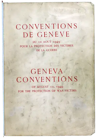 Yellowed page covered in printed red writing, held together with a white binding.