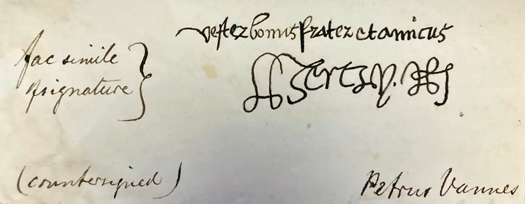 A closeup of a page from a notebook showing a handwritten transcription of Henry VIII's signature.