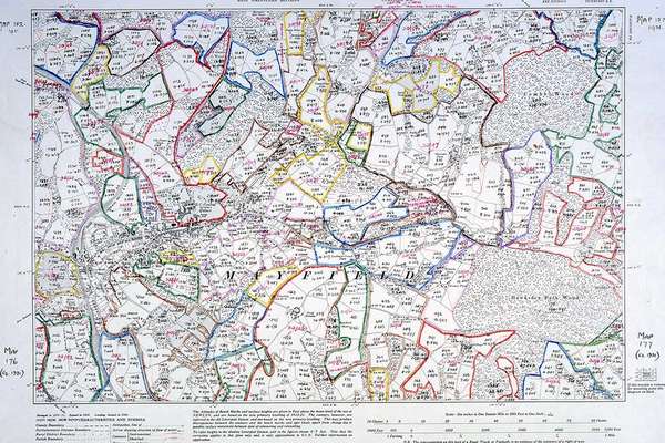 A map of an area which has been divided up into sections with coloured outlines