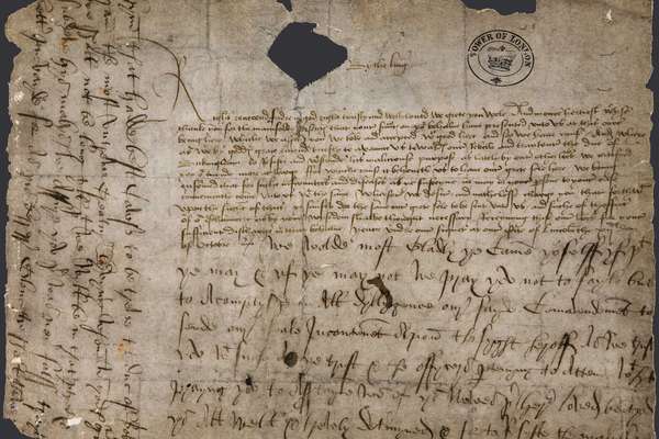Three paragraphs of text written across three areas of a rectangle-shaped document.