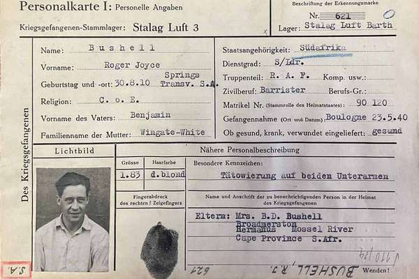 Printed form in German filled in with typewritten text and including Roger's photo and fingerprint.