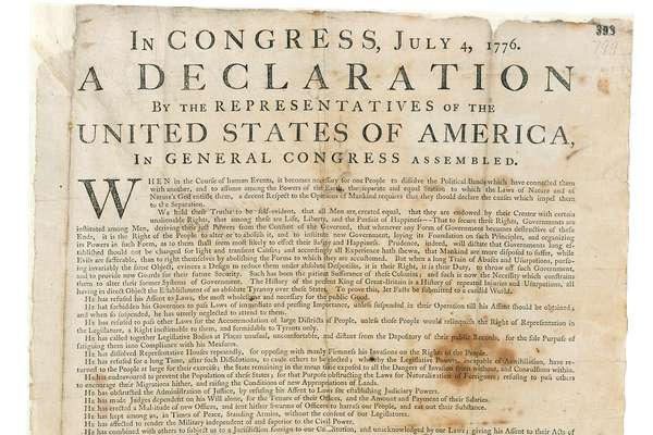 An original copy of the US Declaration of Independence dated 'July 4, 1776'. It is a typed document. At the bottom of the document it says it was printed in Baltimore by 'John Dunlap'.