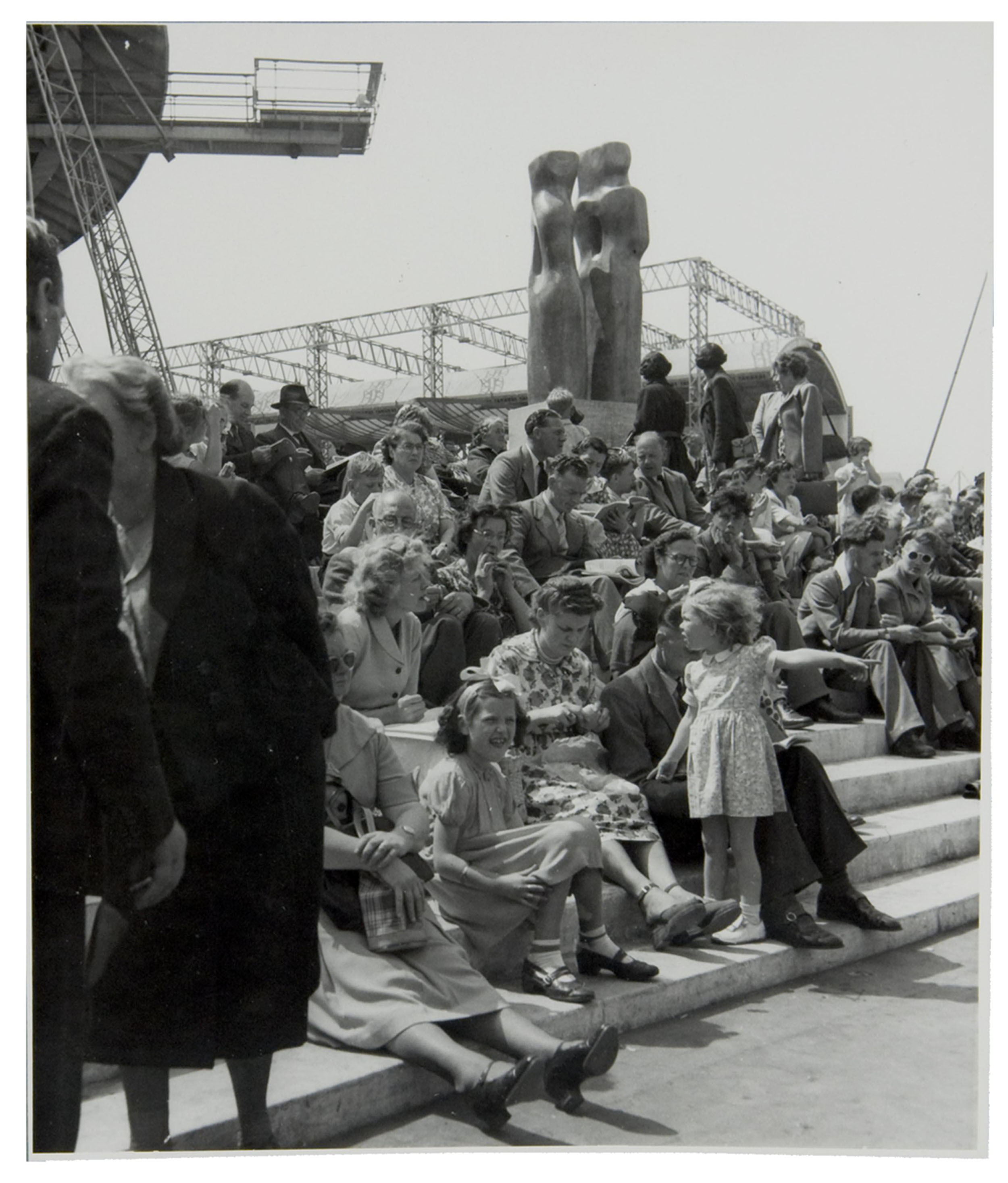 A photograph of a crowd with a Barbara Hepworth sculpture at the Festival of Britain, 1951 (catalogue reference: WORK25/213)